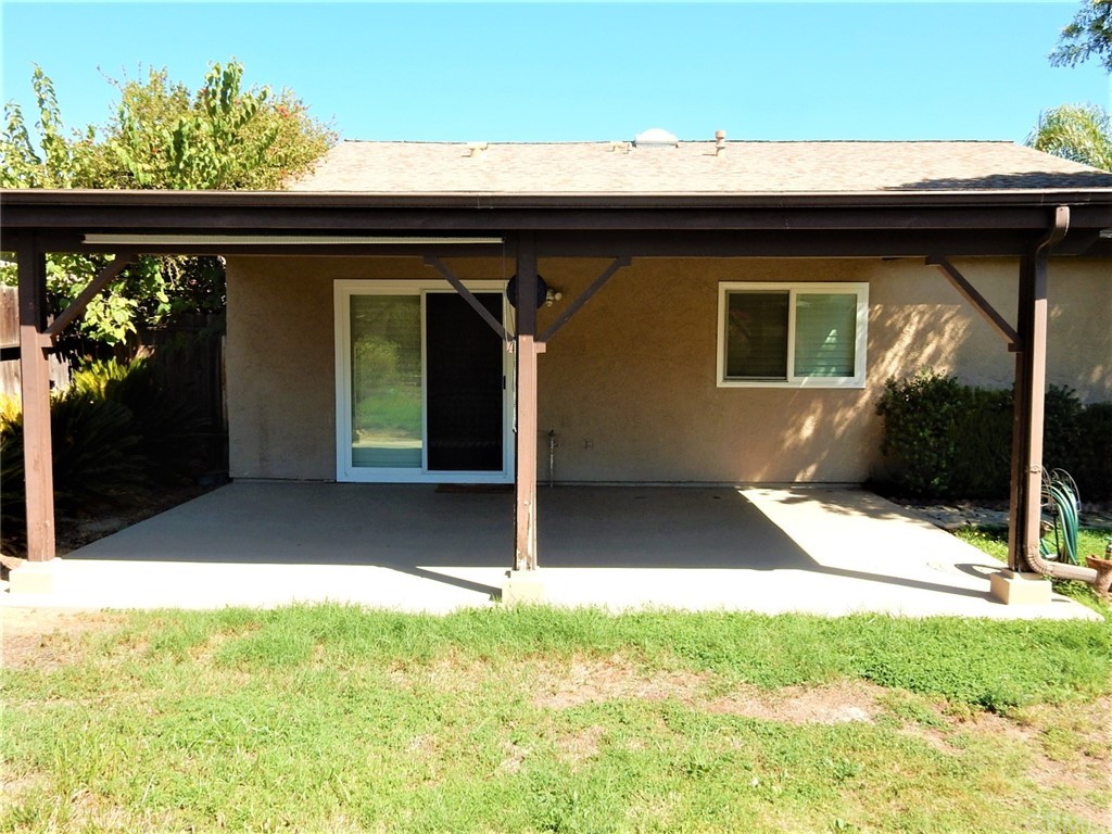 175 North Torn Ranch Road Lake Elsinore, CA 92530 - Photo 28 of 31 Covered patio leading to the family room.