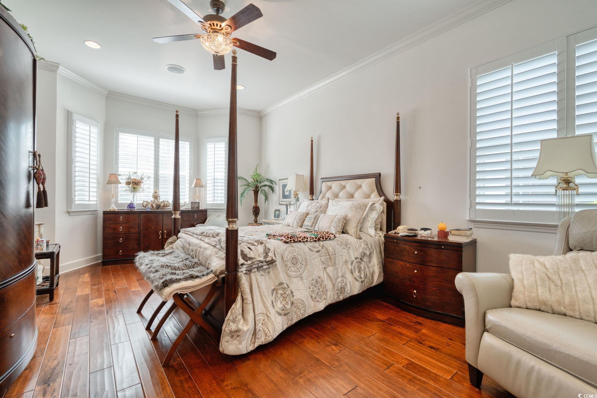 492 Grand Cypress Way Murrells Inlet, SC 29576 - Photo 17 of 40 Bedroom with wood-type flooring, crown molding, a ceiling fan, and recessed lighting