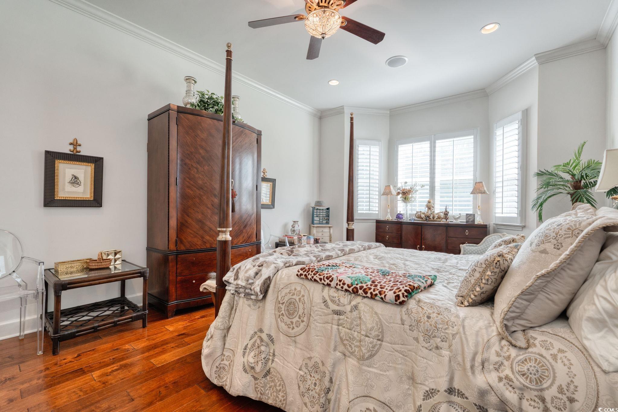 492 Grand Cypress Way Murrells Inlet, SC 29576 - Photo 18 of 40 Bedroom featuring wood-type flooring, recessed lighting, crown molding, and ceiling fan