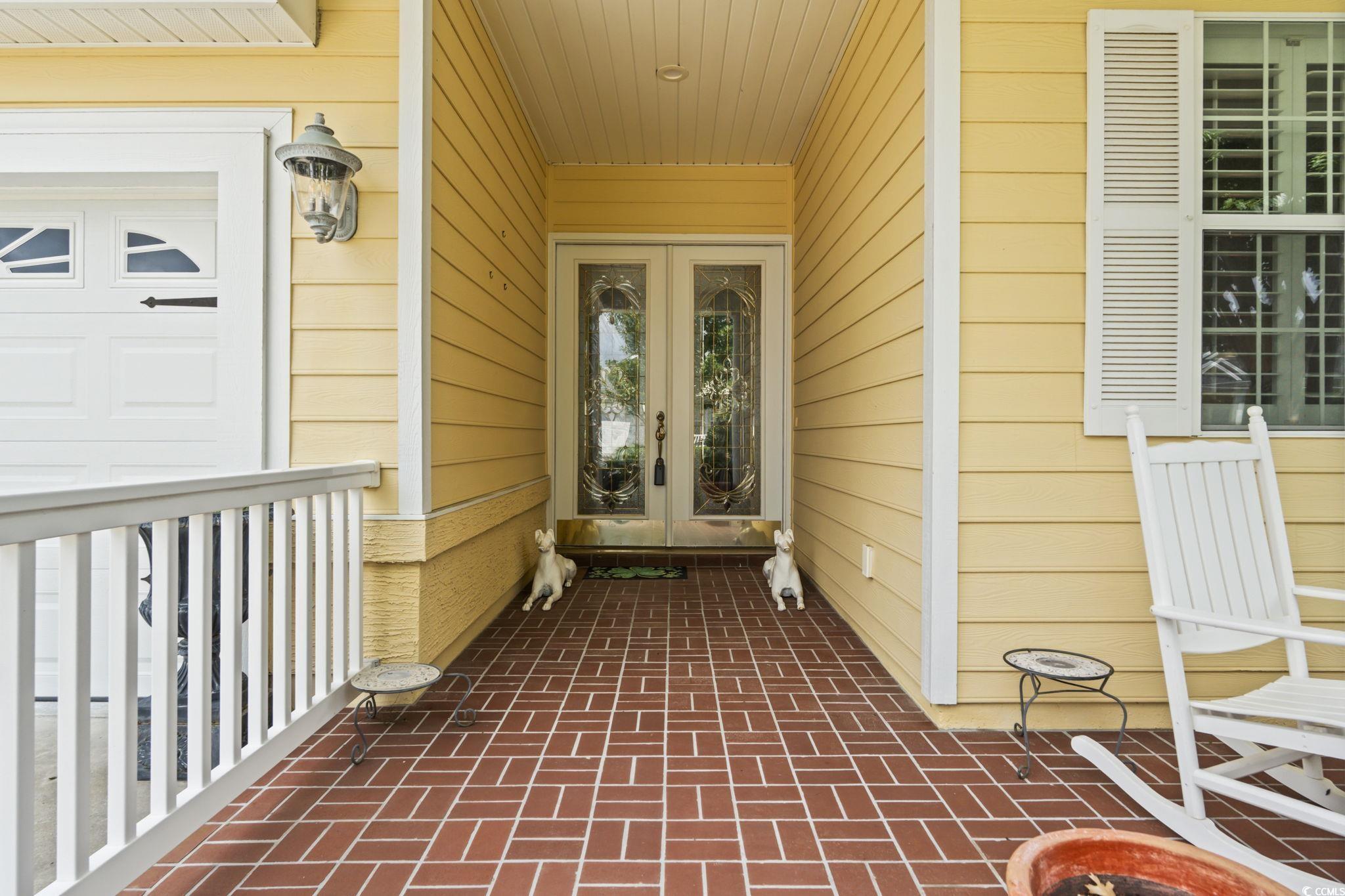 492 Grand Cypress Way Murrells Inlet, SC 29576 - Photo 2 of 40 Doorway to property with french doors and covered porch