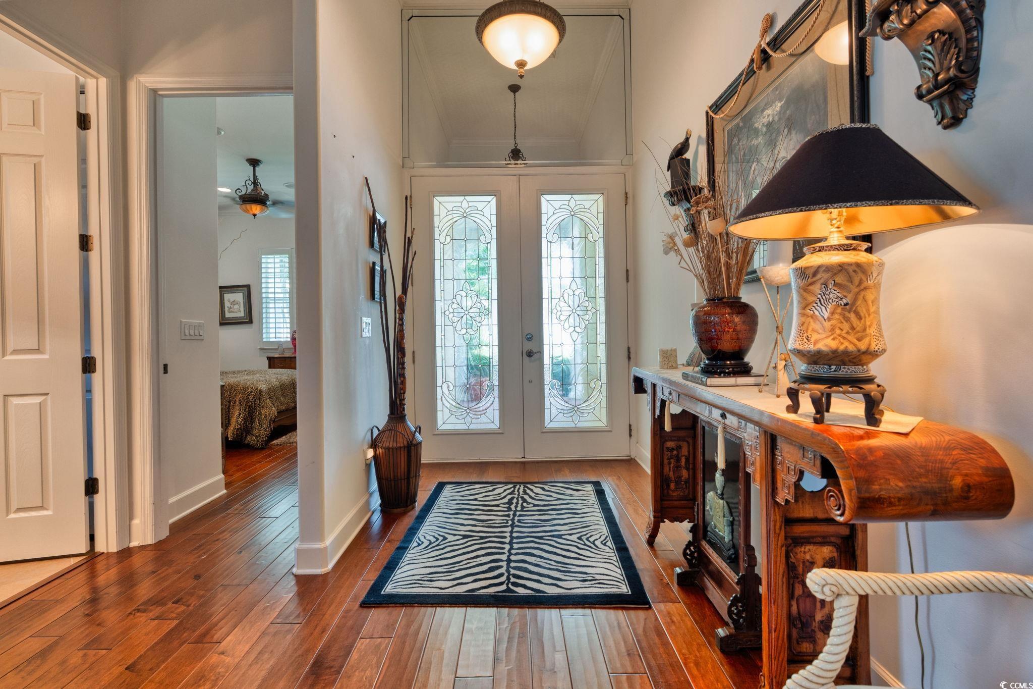 492 Grand Cypress Way Murrells Inlet, SC 29576 - Photo 3 of 40 Entrance foyer featuring french doors and hardwood / wood-style flooring