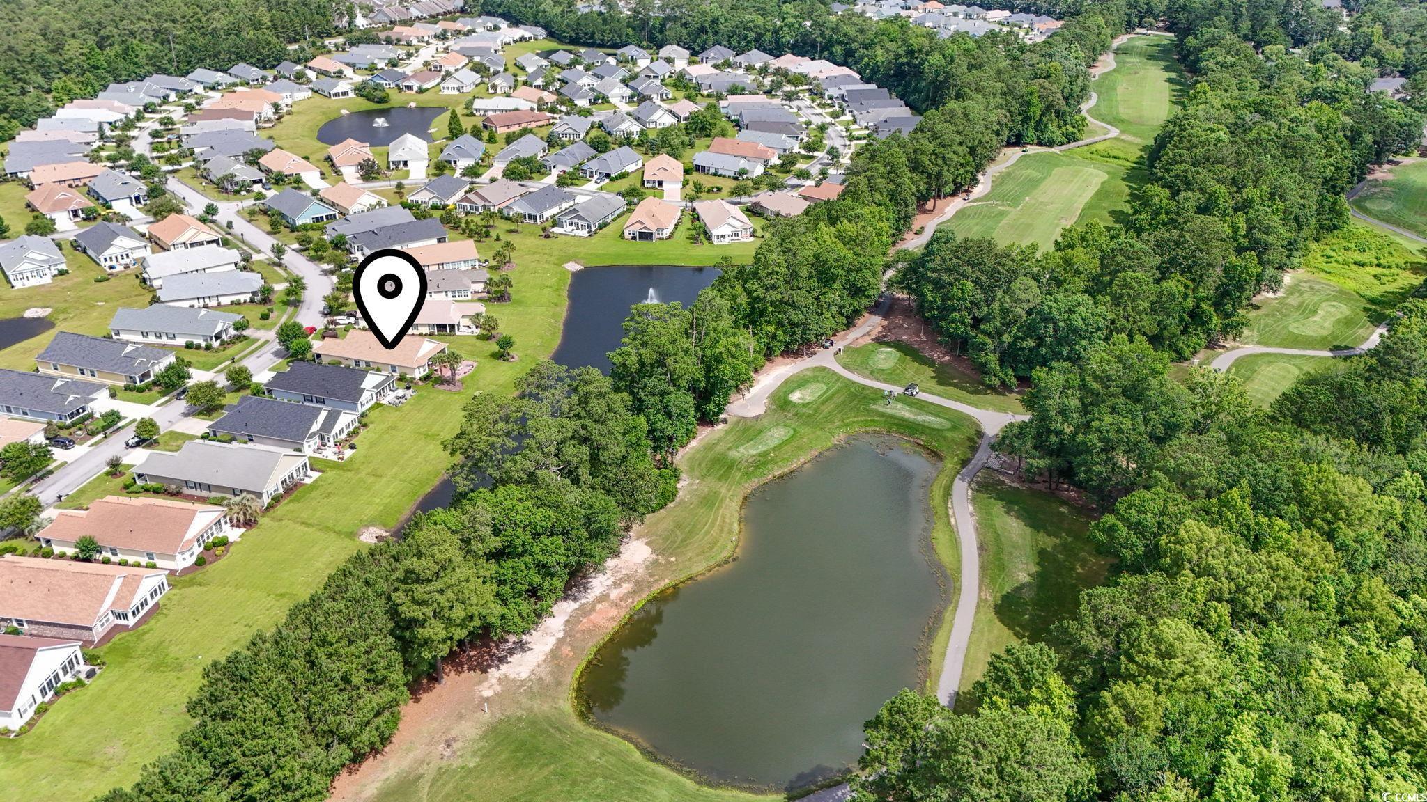 492 Grand Cypress Way Murrells Inlet, SC 29576 - Photo 37 of 40 Aerial view of property's location with a large body of water, nearby suburban area, and a golf club
