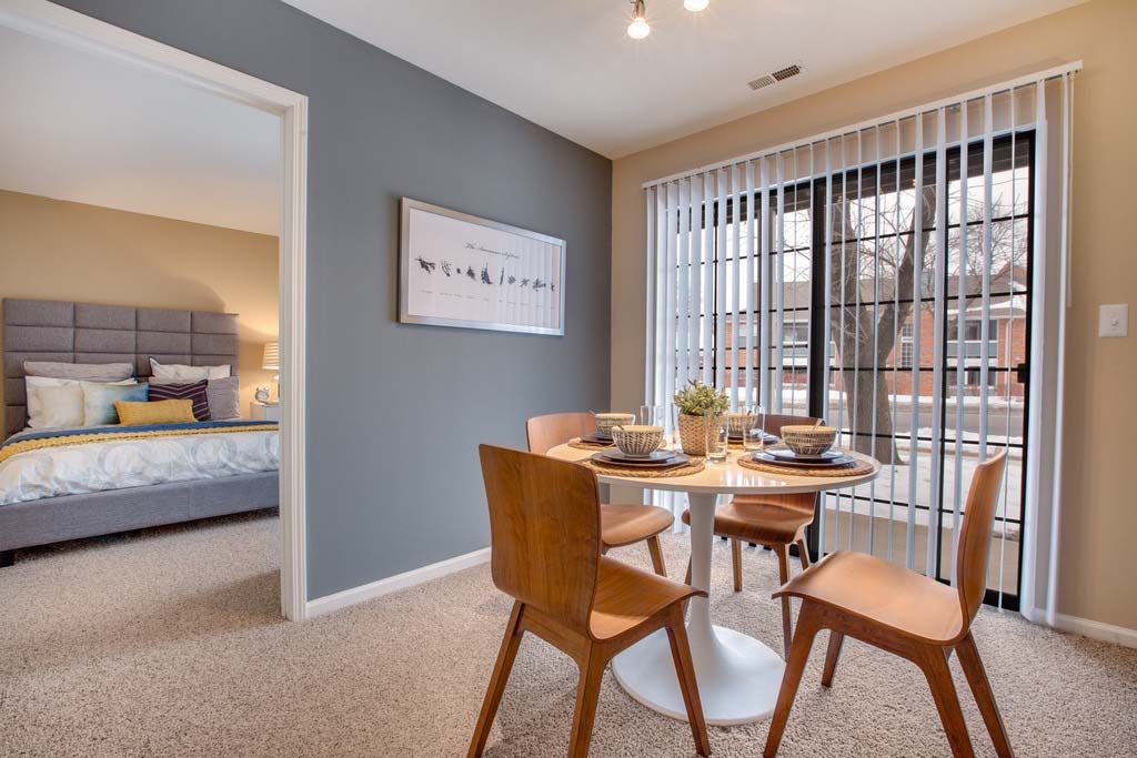127 MacArthur Drive, Unit 4212 Willowbrook, IL 60527 - Photo 9 of 29 a view of a dining room with furniture and a large window