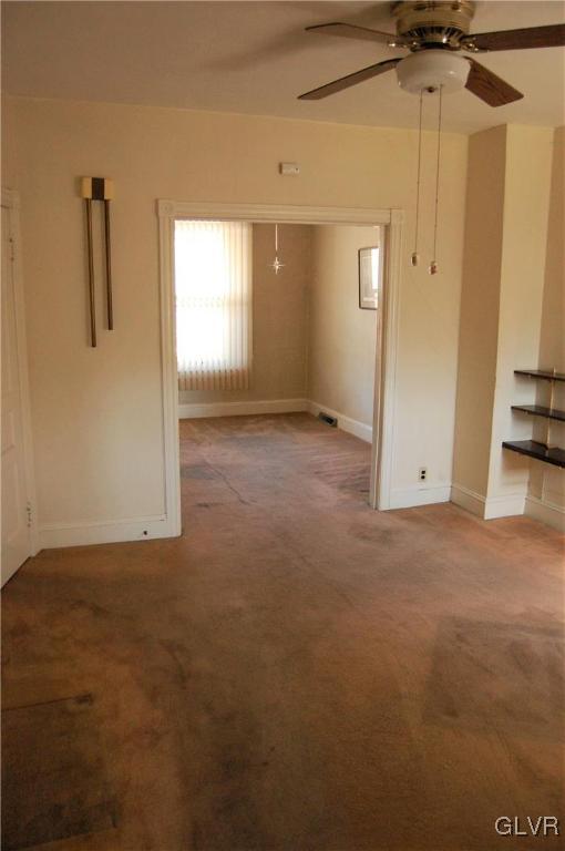 915 Spring Street Bethlehem, PA 18018 - Photo 3 of 20 a view of a big room with closet and windows