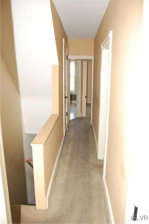 915 Spring Street Bethlehem, PA 18018 - Photo 8 of 20 a view of a hallway with windows