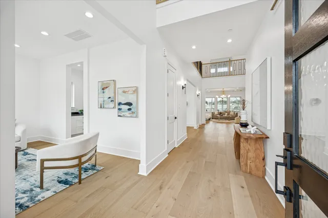 a view of a living room and a wooden floor