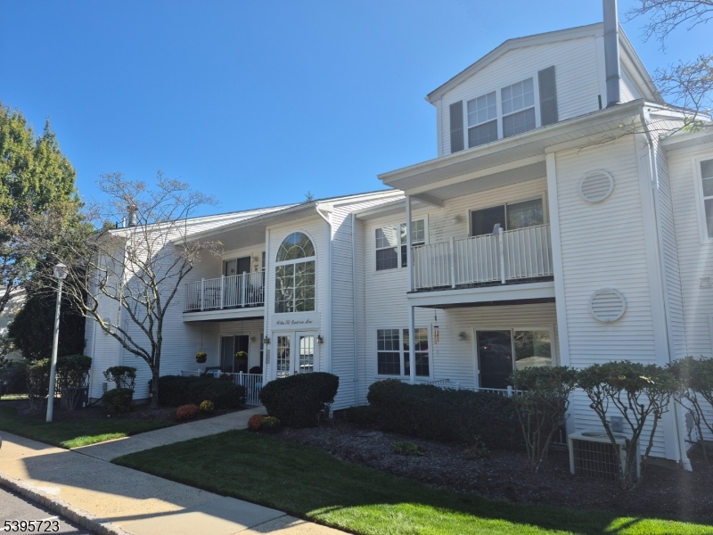 45 Crestview Lane Mount Arlington, NJ 07856 - Photo 1 of 11 a front view of a building with garden