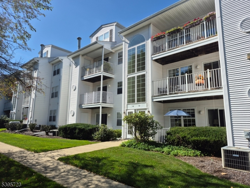 45 Crestview Lane Mount Arlington, NJ 07856 - Photo 2 of 11 a front view of a house with a yard