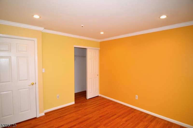 45 Crestview Lane Mount Arlington, NJ 07856 - Photo 7 of 11 a view of empty room with wooden floor