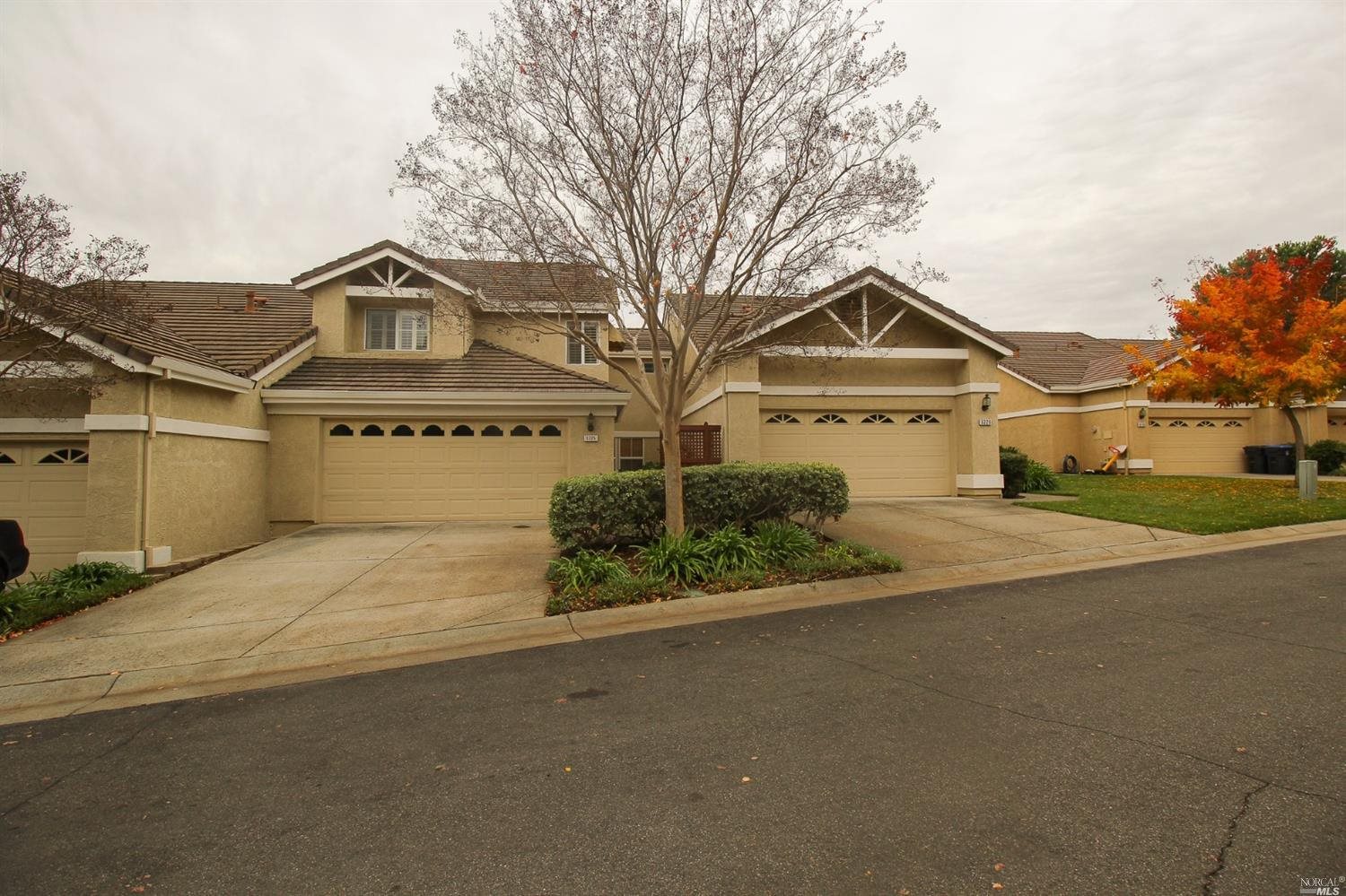 front view of a house with a street