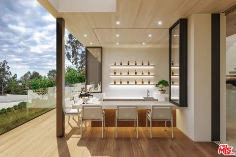 a kitchen with stainless steel appliances granite countertop a stove and a refrigerator