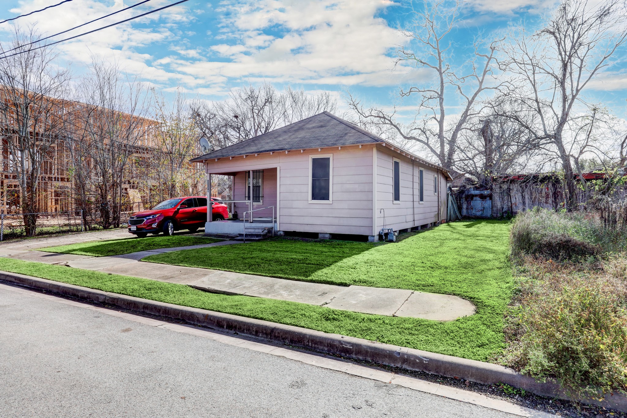 3230 Bremond Street Houston, TX 77004 - Photo 10 of 10 a front view of a house with a yard and garage