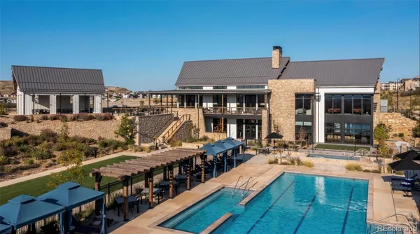 a view of a house with swimming pool