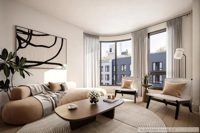 a living room with furniture and a floor to ceiling window