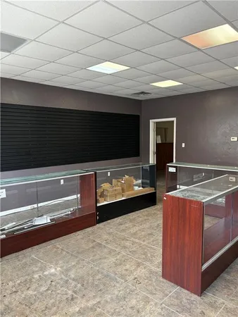 a kitchen with stainless steel appliances a stove and a microwave