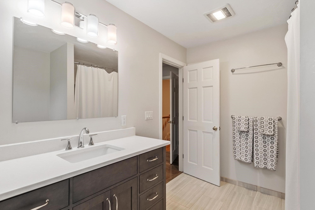 94 Turner Road Townsend, MA 01469 - Photo 23 of 42 a view of bathroom with a sink mirror and shower