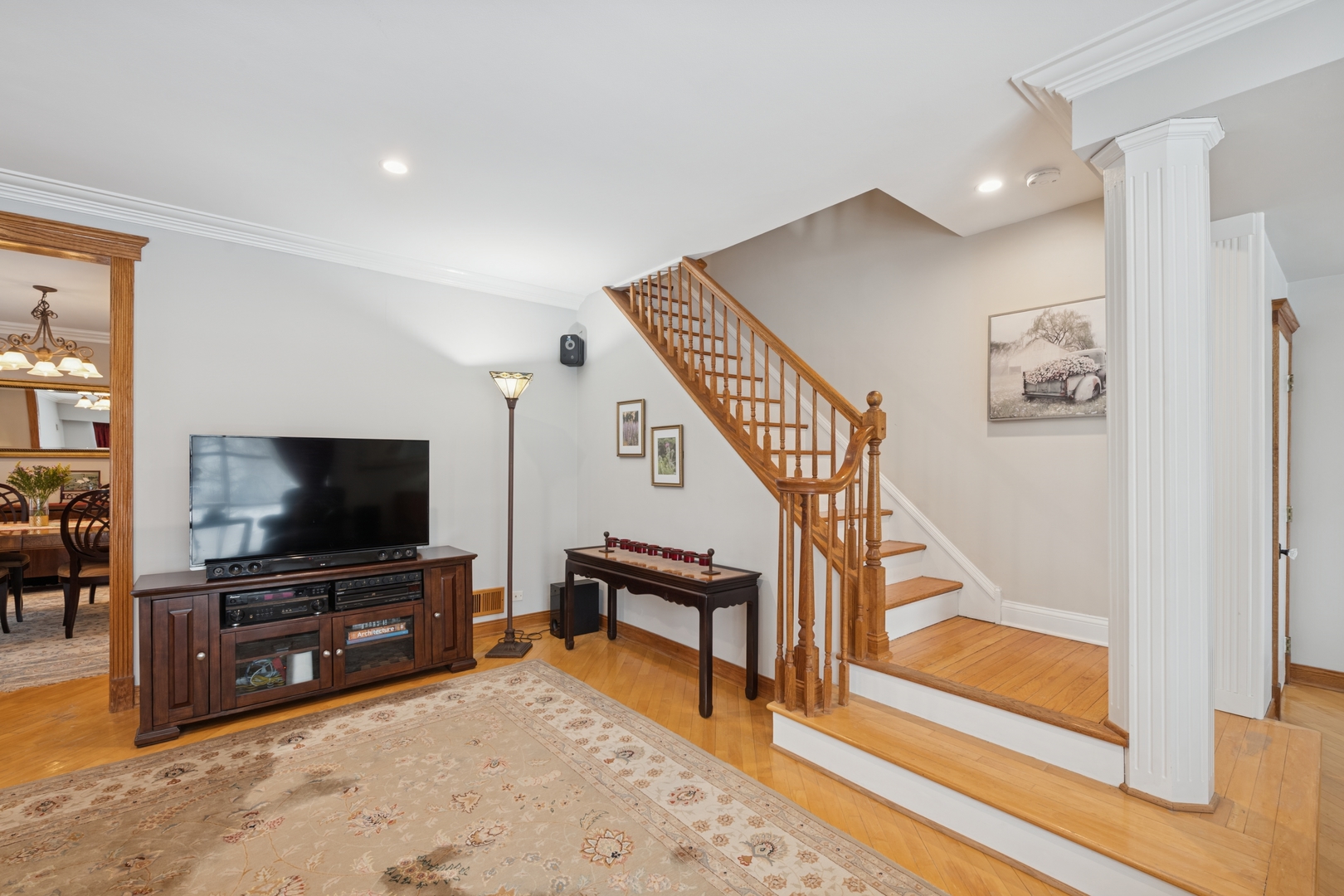 369 Addison Road Riverside, IL 60546 - Photo 5 of 23 a living room with furniture and a flat screen tv