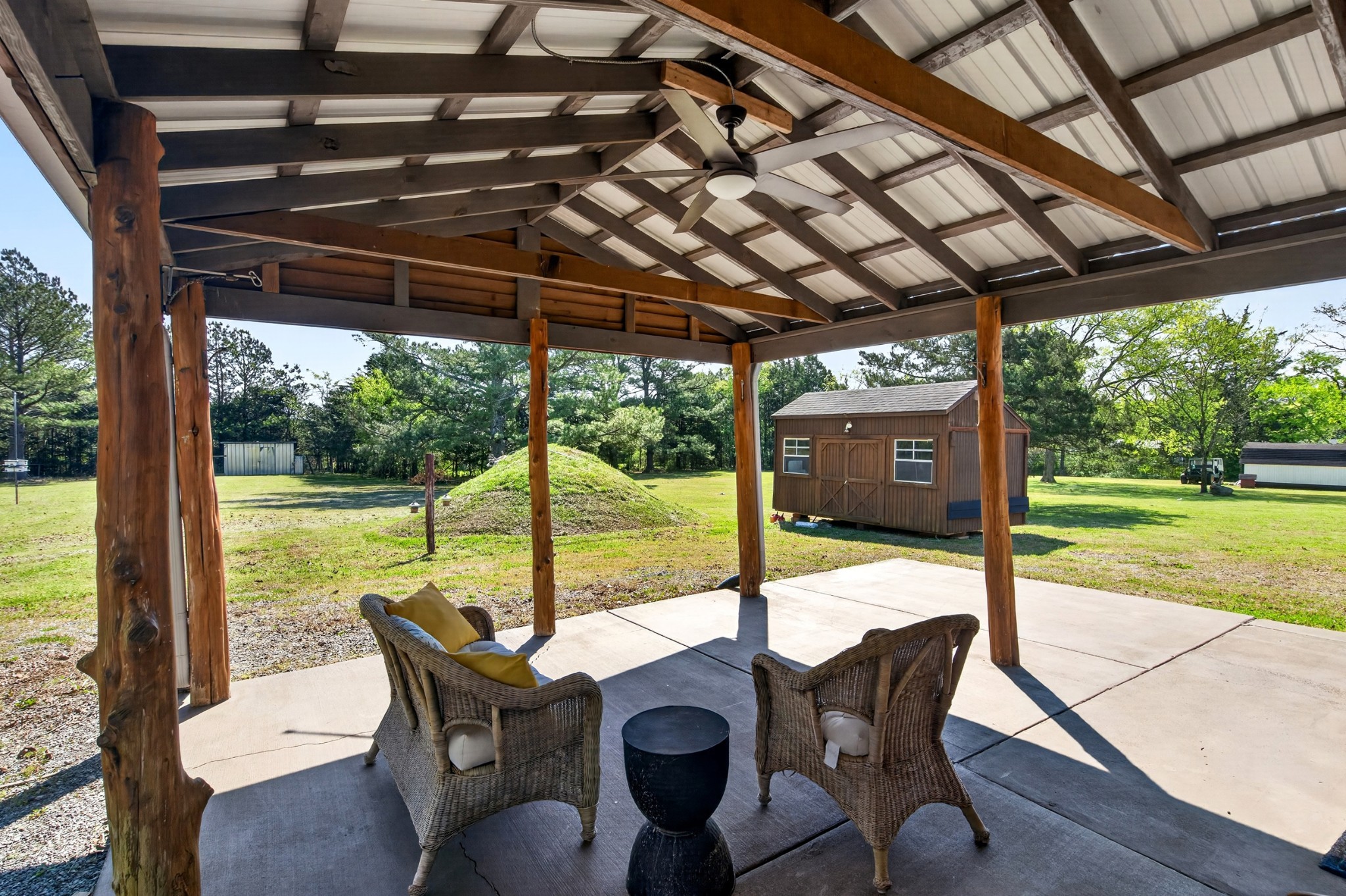 186 Baxter Road Murfreesboro, TN 37130 - Photo 27 of 39 a view of a patio with a table chairs and a backyard