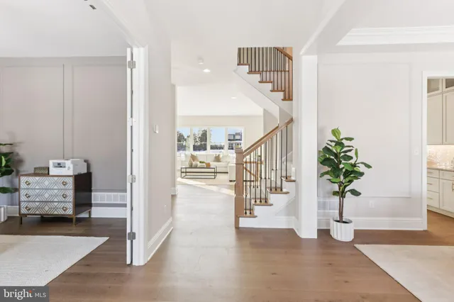 a bathroom with a toilet a sink and a mirror