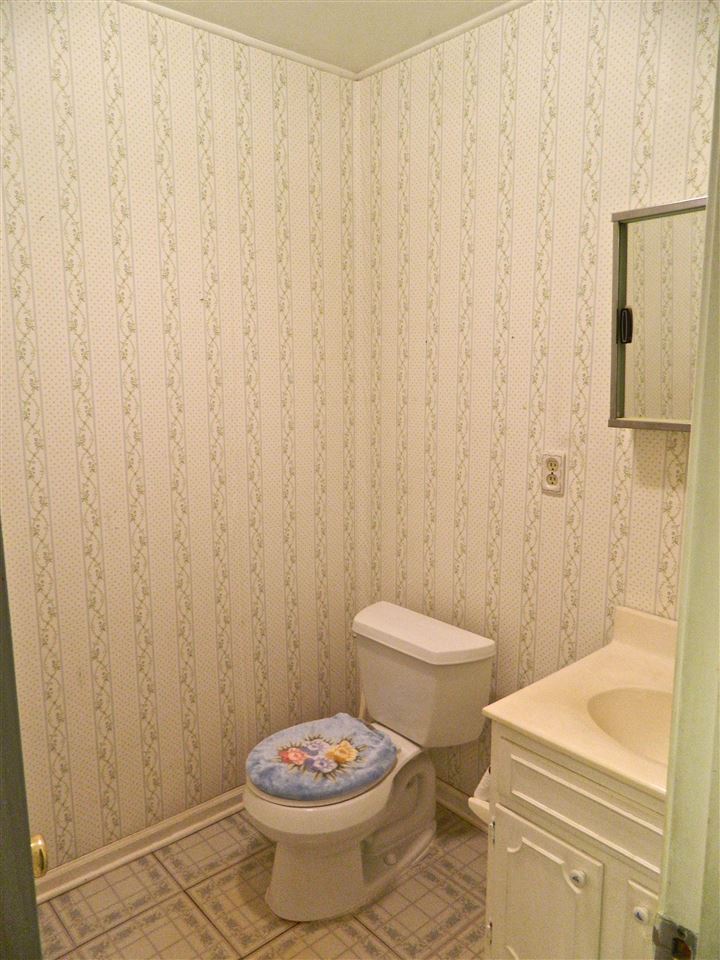 2940 Courthouse Road Louisa, VA 23093 - Photo 4 of 4 a bathroom with a toilet and a shower curtain