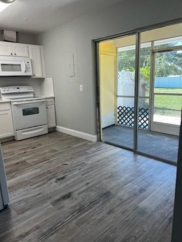 Undisclosed Address Sebastian, FL 32958 - Photo 9 of 14 a view of a kitchen with wooden floor and electronic appliances