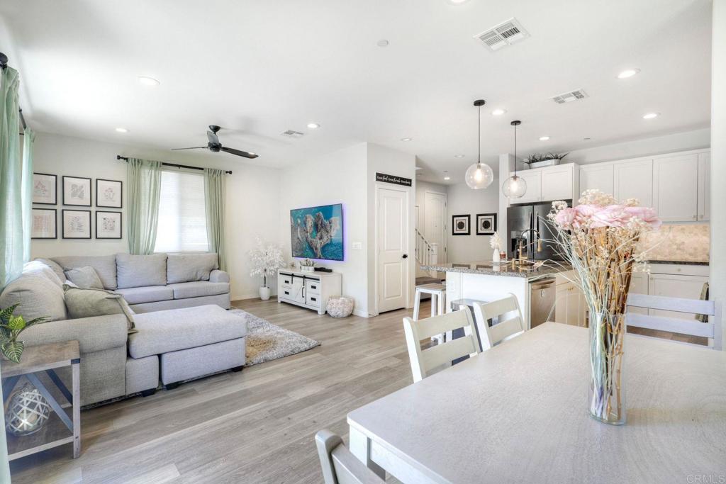 4141 Mission Tree Way Oceanside, CA 92057 - Photo 3 of 29 Lots of natural light in the Family room, Dining area and kitchen.