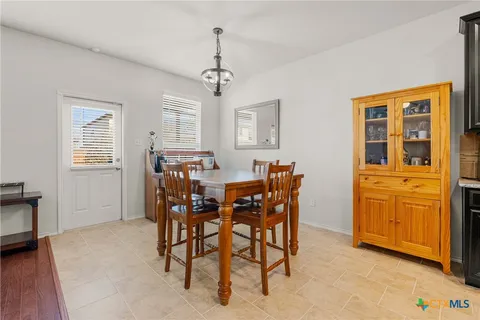 a view of a livingroom with furniture and window