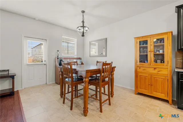 a view of a livingroom with furniture and window