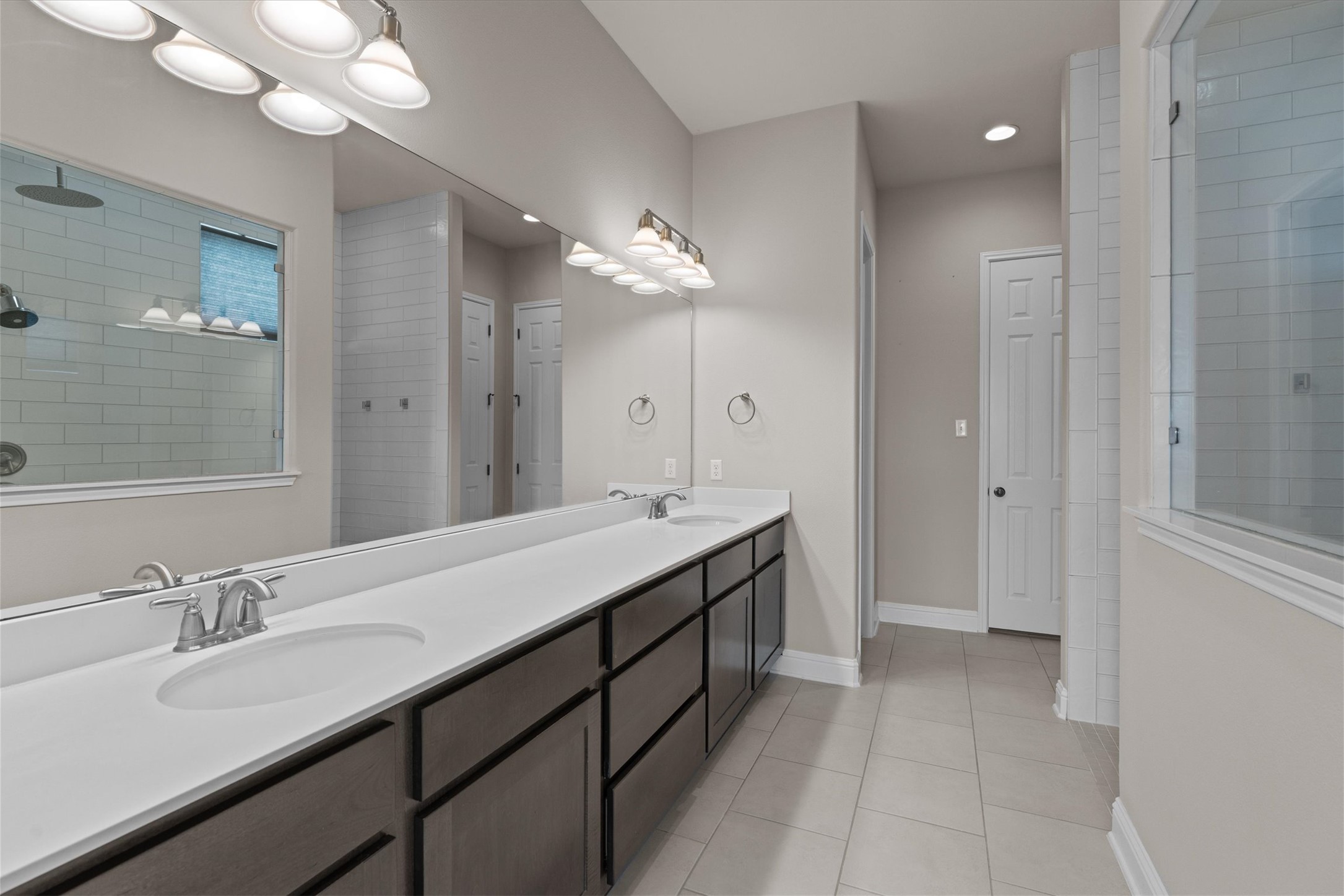 622 Cheyenne Lane Cedar Park, TX 78613 - Photo 15 of 40 The primary bathroom offers a double vanity with plenty of counter space for beginning or ending your day