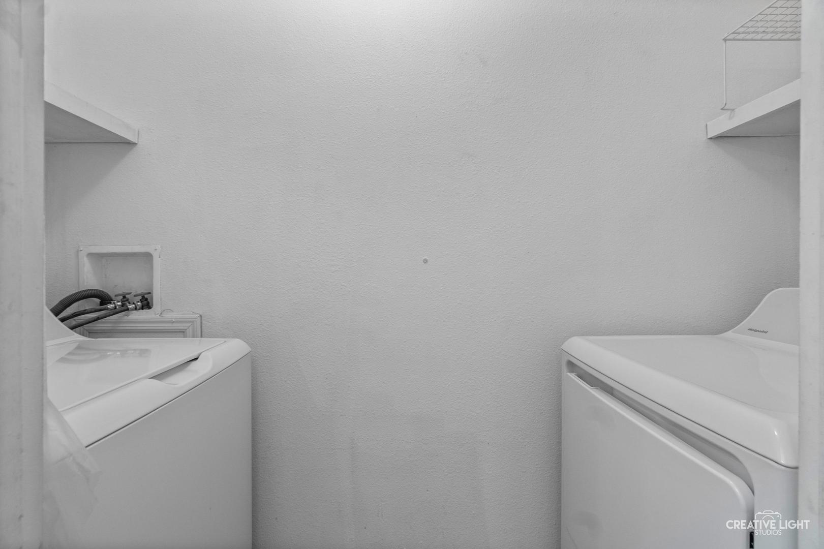 120 Cardinal Lane, Unit A Sandwich, IL 60548 - Photo 12 of 15 a utility room with dryer and washer