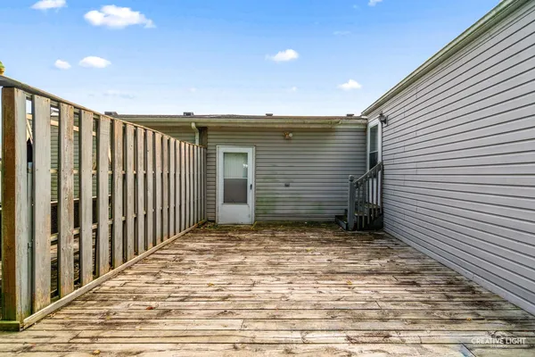 a view of a porch with a door