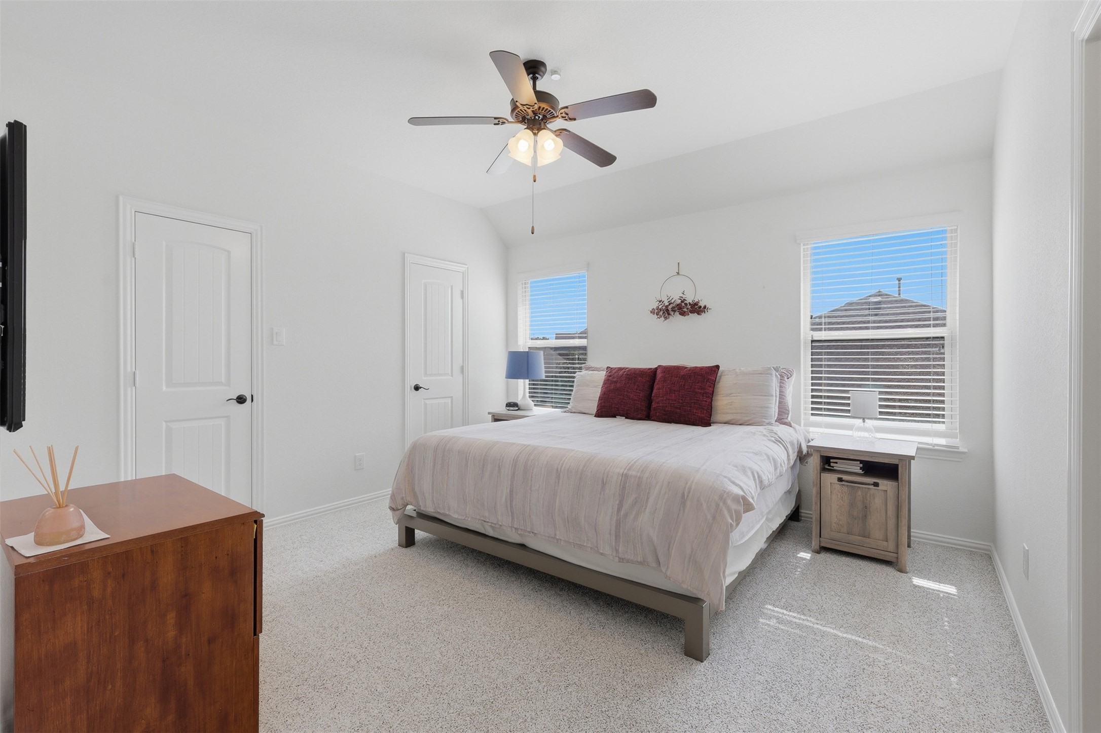 6835 Preston Grove Drive Spring, TX 77389 - Photo 41 of 49 a bedroom with a bed and a ceiling fan