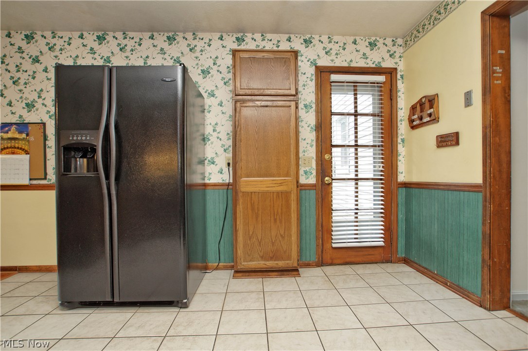 1273 Ford Road Lyndhurst, OH 44124 - Photo 12 of 32 Refridgerator stays with the home. Door leads to the deck.