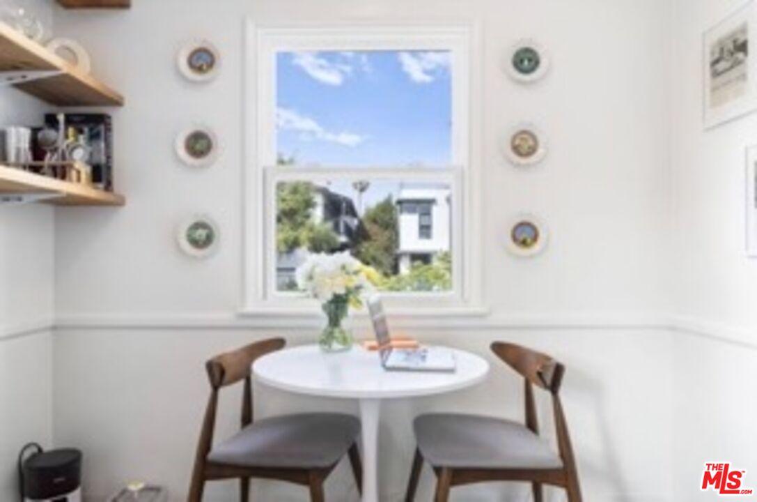 247 3rd Avenue Venice, CA 90291 - Photo 4 of 12 a view of a dining room with furniture and a large window