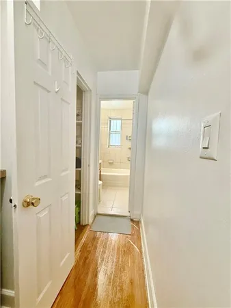 a bathroom with a tub and shower
