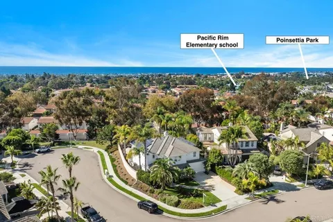 a view of a swimming pool with a yard