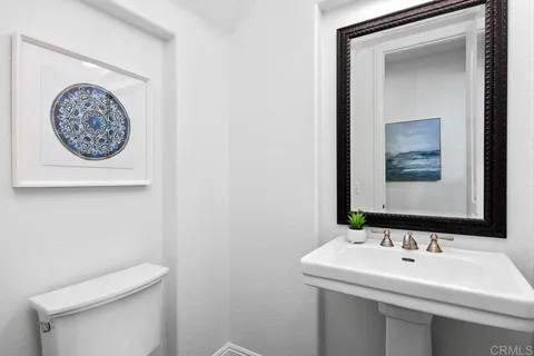 a bed room with a bed and a large window