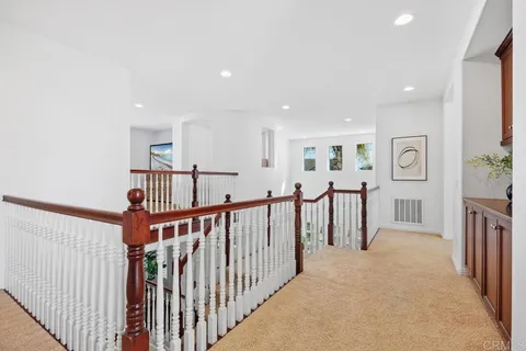 a bath tub sitting in a bathroom next to a window