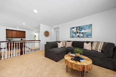 a view of a patio with a table chairs and a table