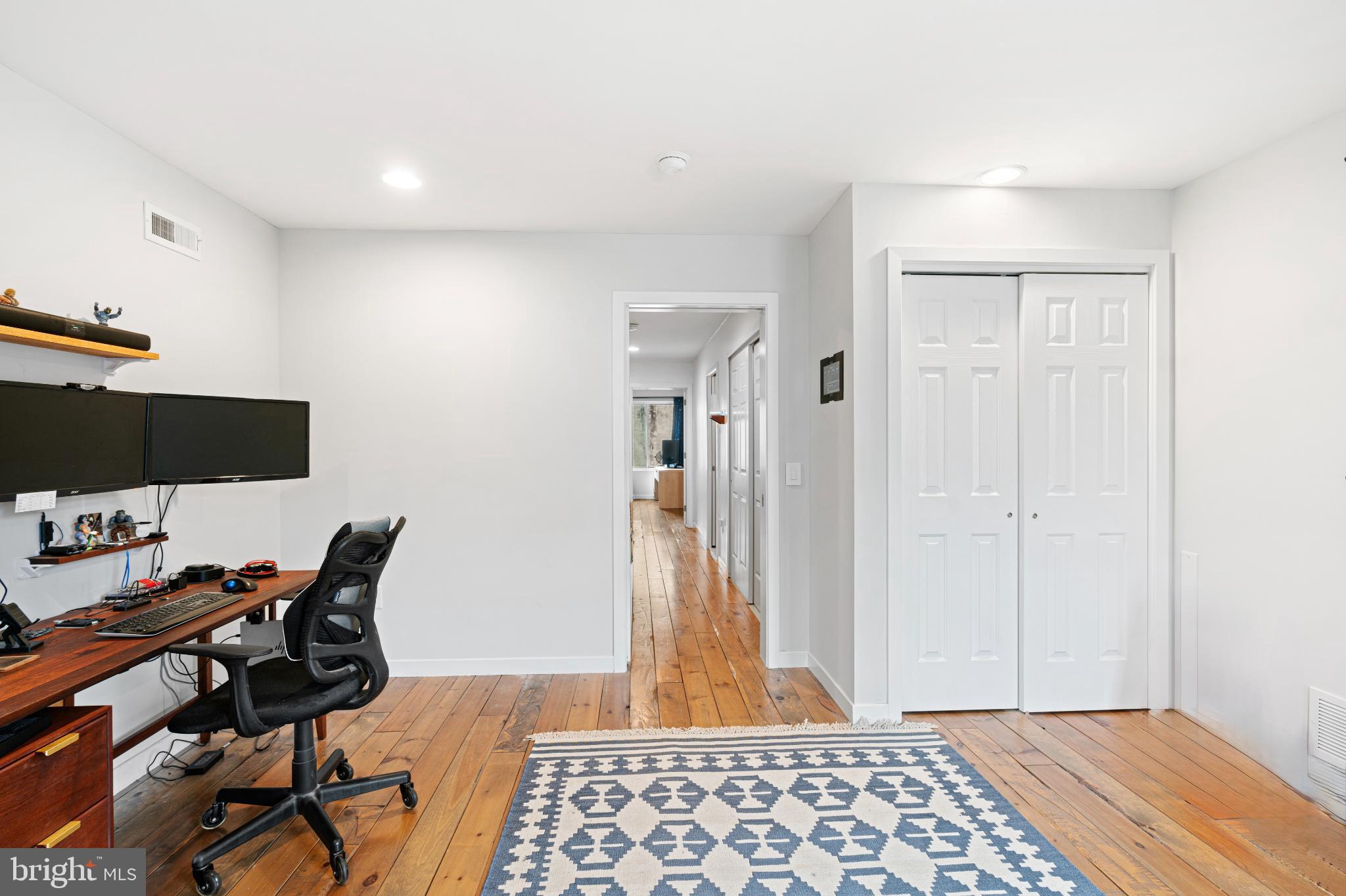 2041 East Sergeant Street Philadelphia, PA 19125 - Photo 17 of 40 Modern workspace with warm wooden floors.