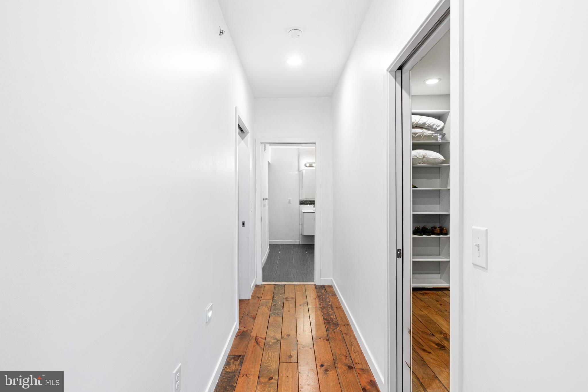 2041 East Sergeant Street Philadelphia, PA 19125 - Photo 22 of 40 Bright hallway with warm wooden floors.