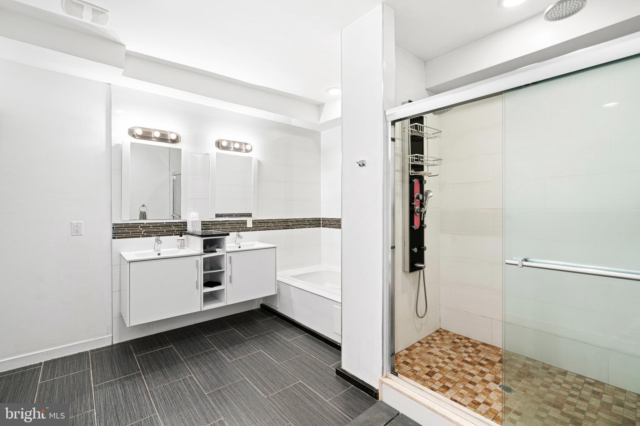 2041 East Sergeant Street Philadelphia, PA 19125 - Photo 24 of 40 Sleek modern bathroom with elegant finishes.