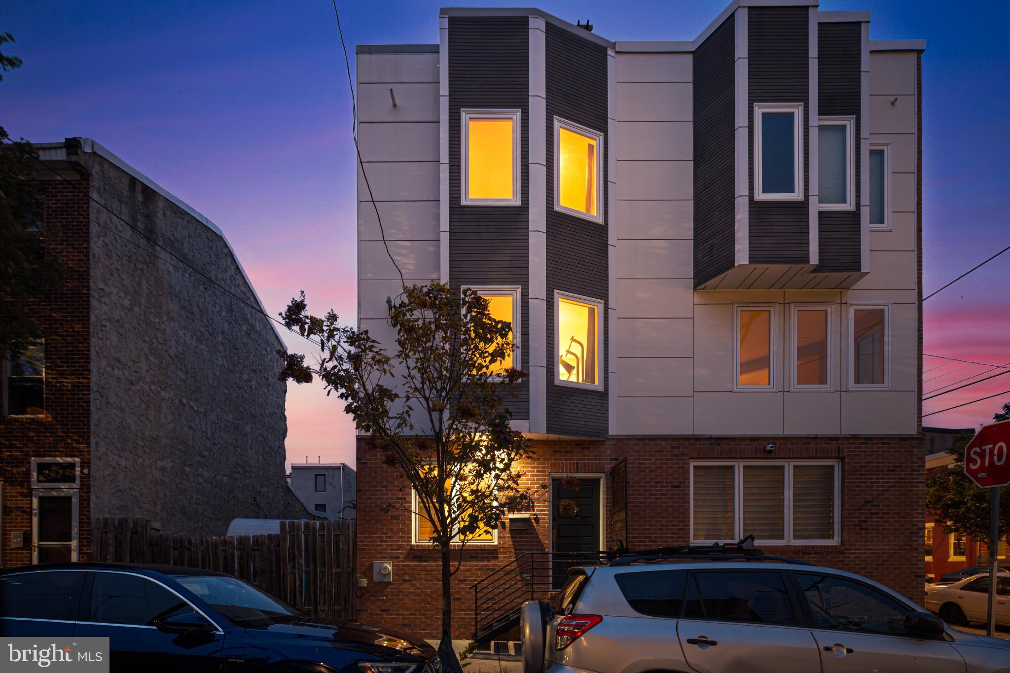 2041 East Sergeant Street Philadelphia, PA 19125 - Photo 35 of 40 Modern home aglow at twilight's embrace.