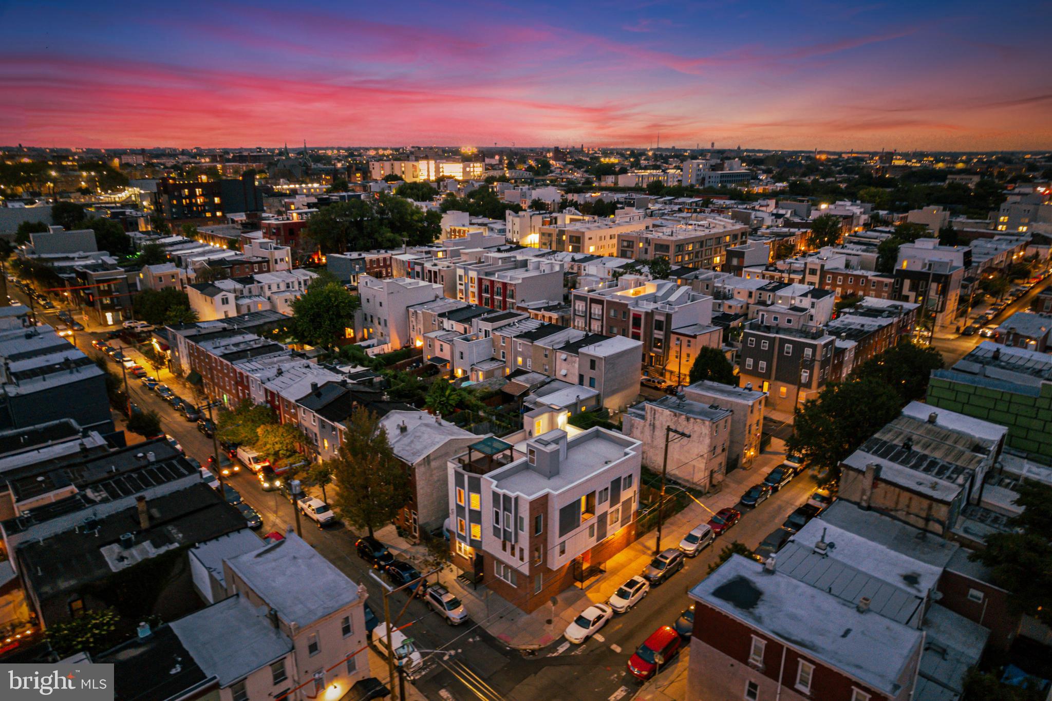2041 East Sergeant Street Philadelphia, PA 19125 - Photo 40 of 40 Vibrant cityscape at dusk, alive with color.