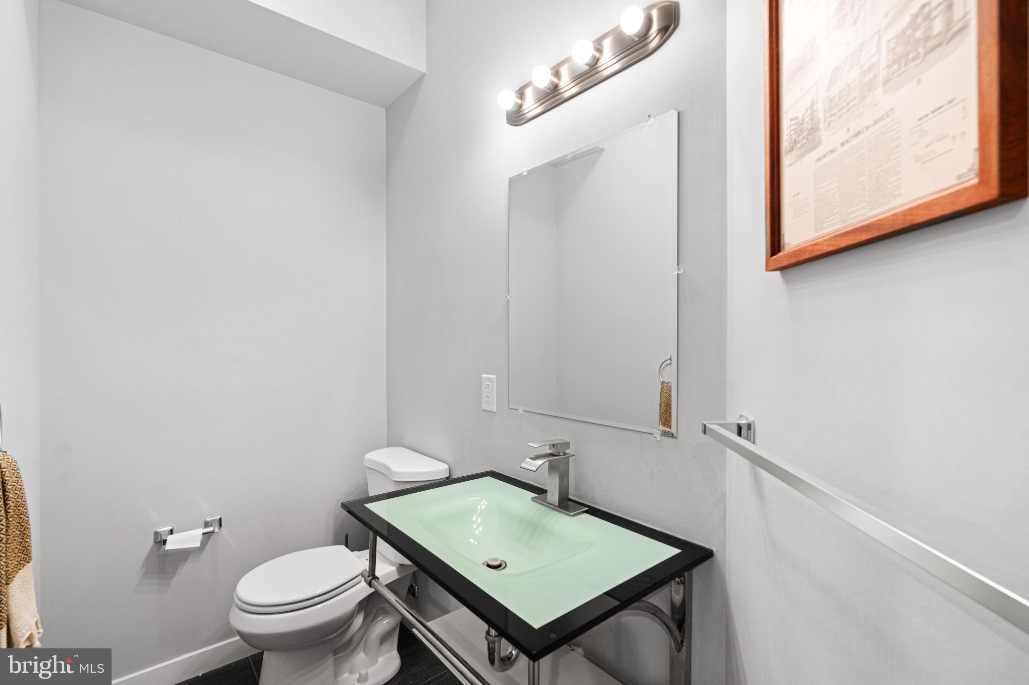 2041 East Sergeant Street Philadelphia, PA 19125 - Photo 9 of 40 Sleek modern bathroom with elegant fixtures.