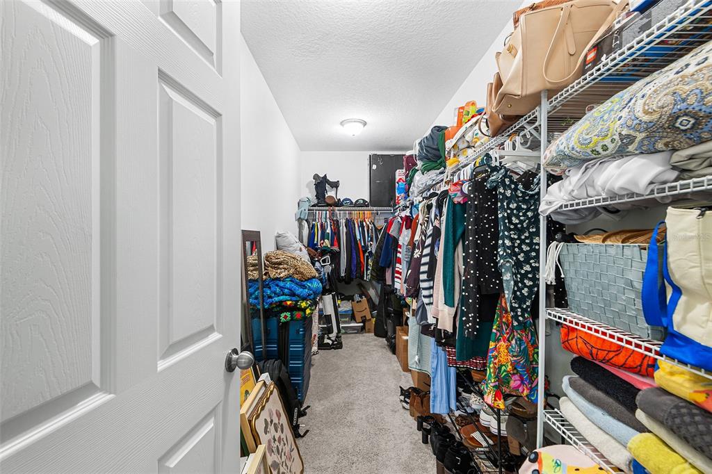 12960 Conquistador Loop Spring Hill, FL 34610 - Photo 17 of 26 a view of a walk in closet