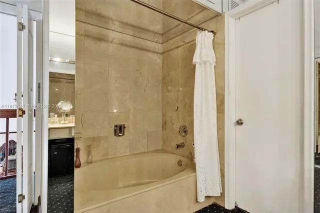 a view of hallway with wooden floor