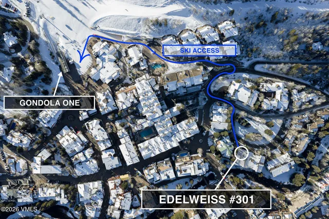 a front view of a building with sitting area