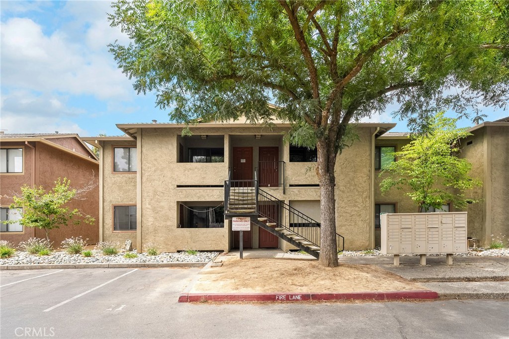 1114 Nord Avenue, Unit 11 Chico, CA 95926 - Photo 20 of 47 a house with tree in front of it