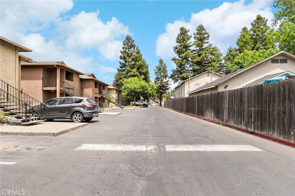 1114 Nord Avenue, Unit 11 Chico, CA 95926 - Photo 21 of 47 a view of a street with a car parked in front of it